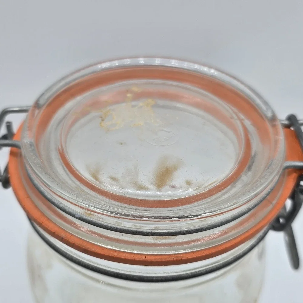 Vintage glass canister with wheat design Lid is stamped arc France